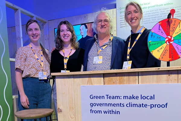 People standing at an exhibition stand