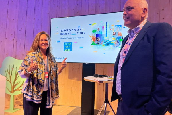 Two people presenting project