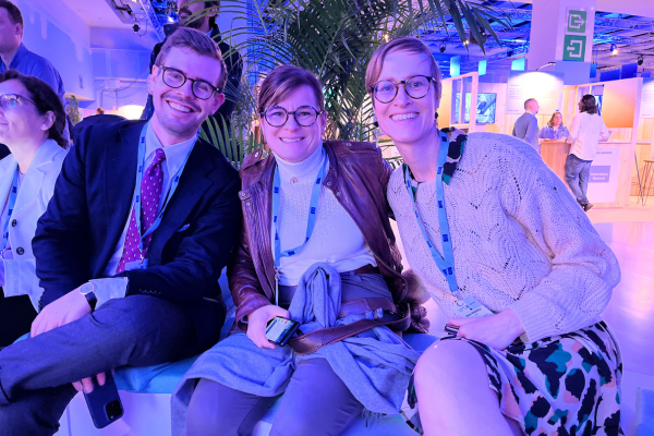 3 people sat on a bench