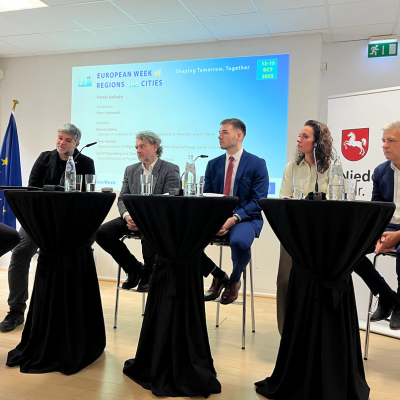 People sat at high tables