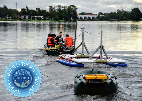 Small boat on water with measuring device