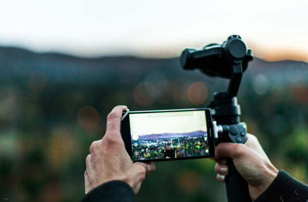 Person filming scenary 