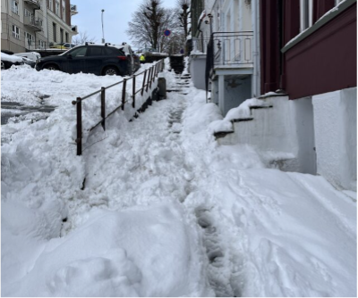 A snowwy sidewalk in Bergen