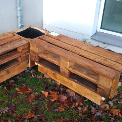 A bench made by school kids with space for biodiversity