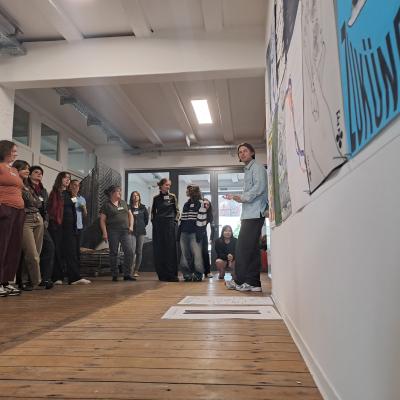 Group of people looking at wall of ideas