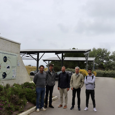 men standing next to building