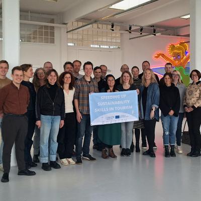 All the partners at our traditional group photo with our new project flag.