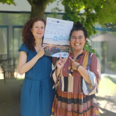 Project Partners Evy and Johanna from Westtoer with their official project poster.