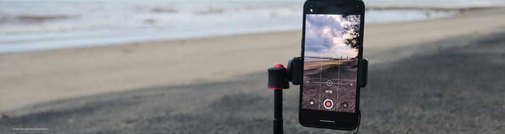 A mobile phone recording a beach scene